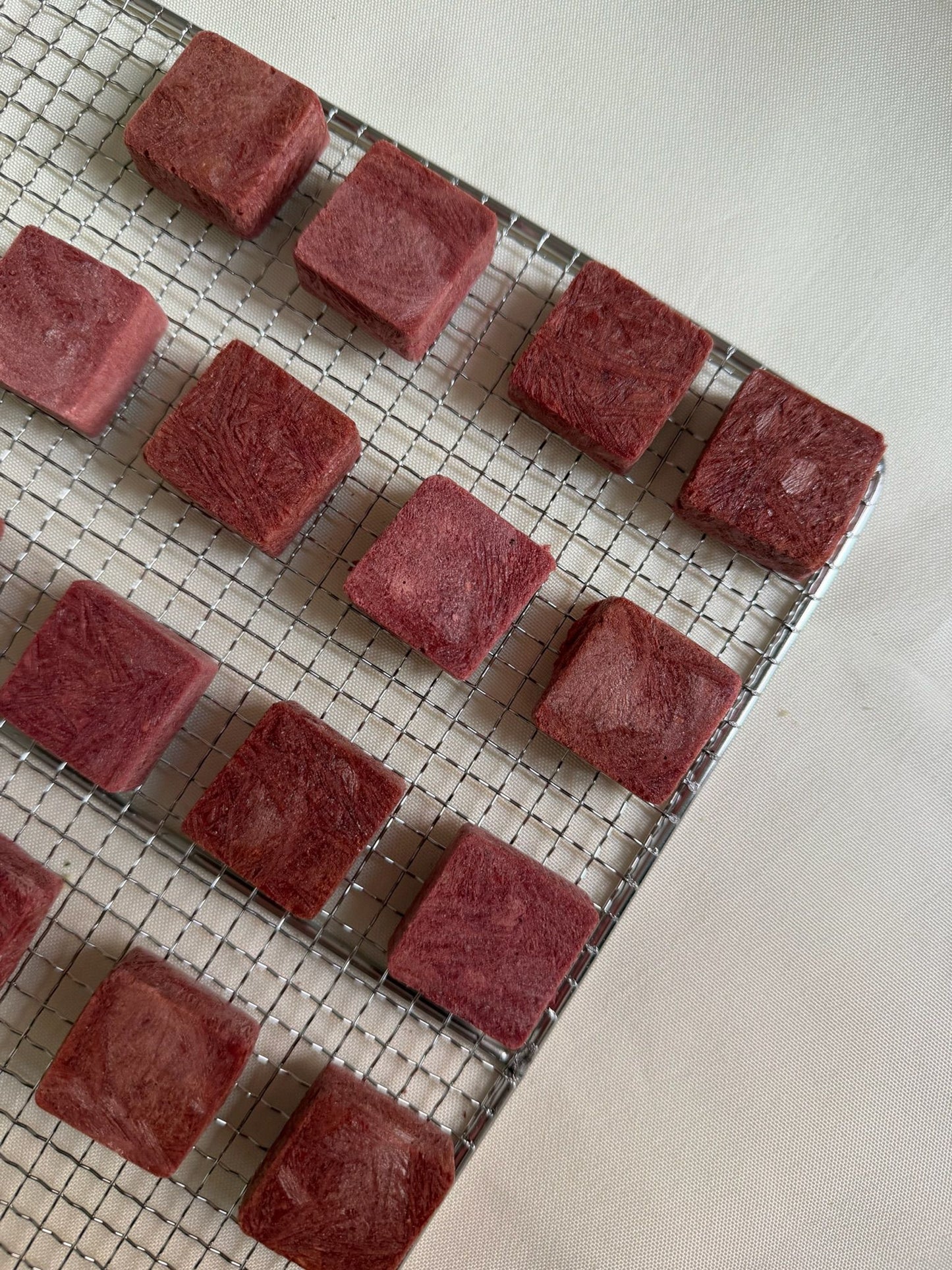Freeze-dried goji berries, beetroot, and venison crisps